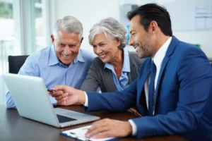 Financial advisor reviewing tax planning documents while discussing common tax management myths with a client